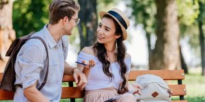 conversation between young couples in a park