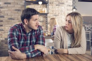 couples in a conversation at a cafe